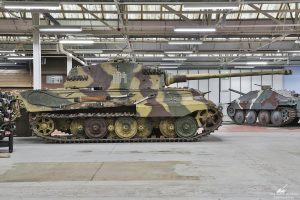 The second shot hit the tank above the dark brown road wheel.