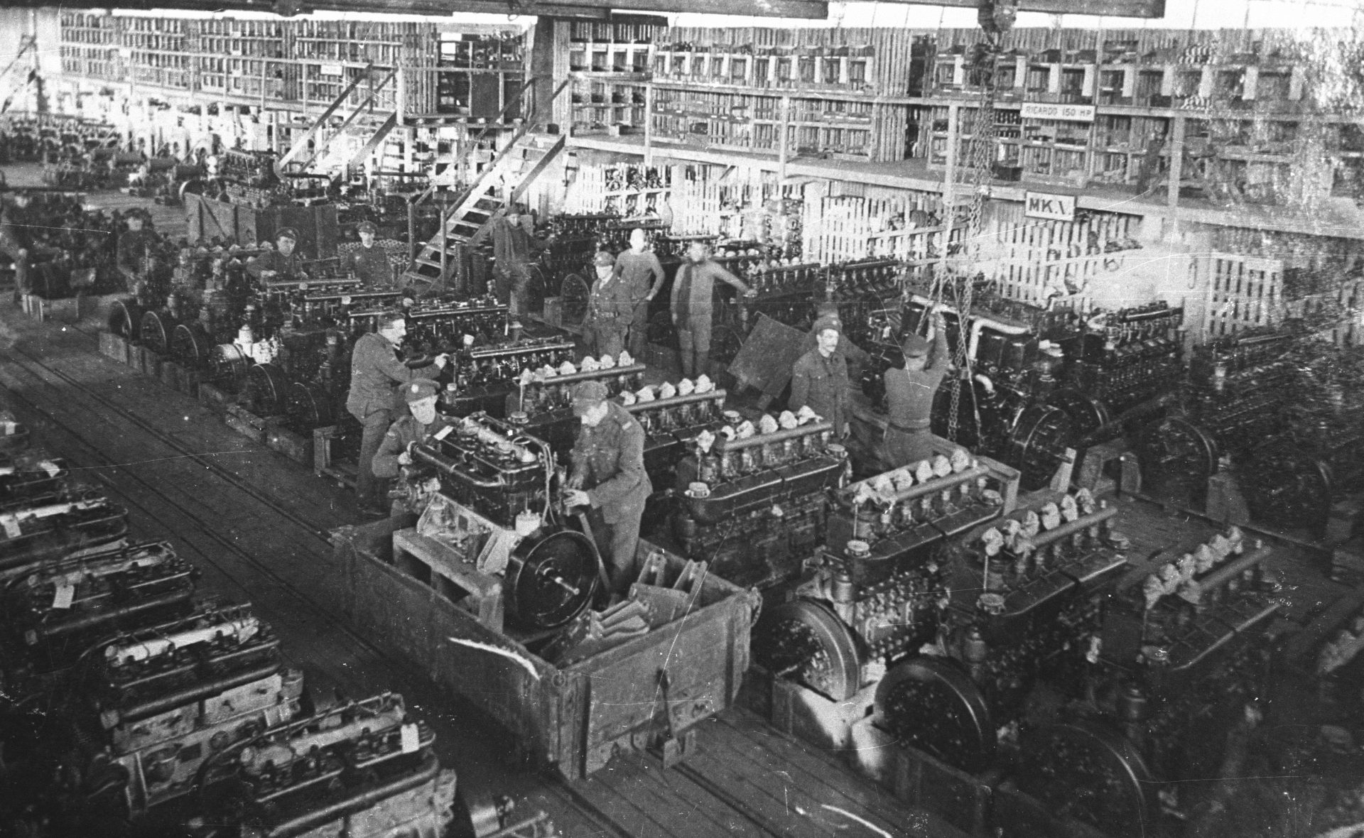 P_Ricardo-engines_Central-Stores_1918_0080-B3 A black and white photo of ricardo engines and men working on them.