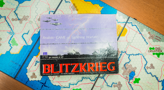 Blitzkrieg Image shows the board game Blitz. The box with text in red is on top of the board.