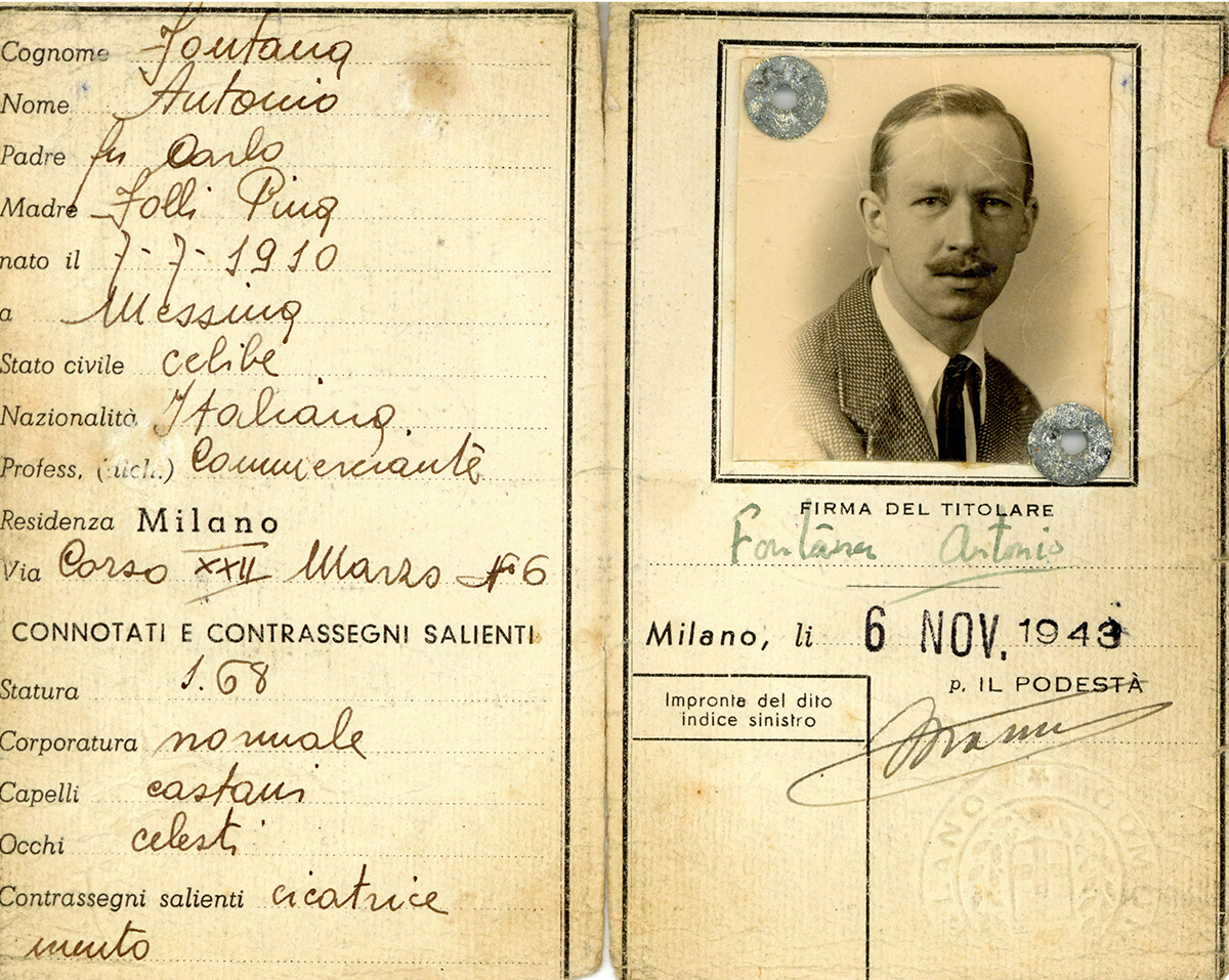 Feature E2024.359.14 Resistance ID Cream old ID document with a black and white photograph on it