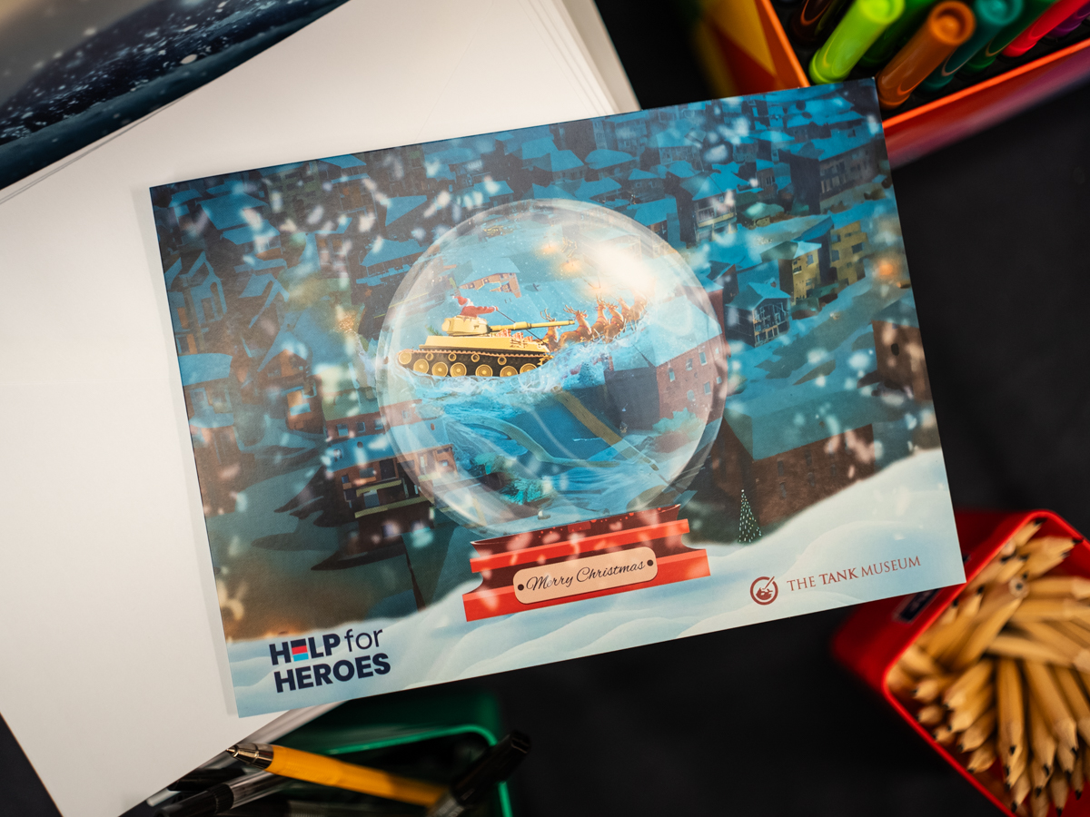 Christmas Letter to a Veteran 2 Christmas card featuring a tank sleigh in a snow globe.