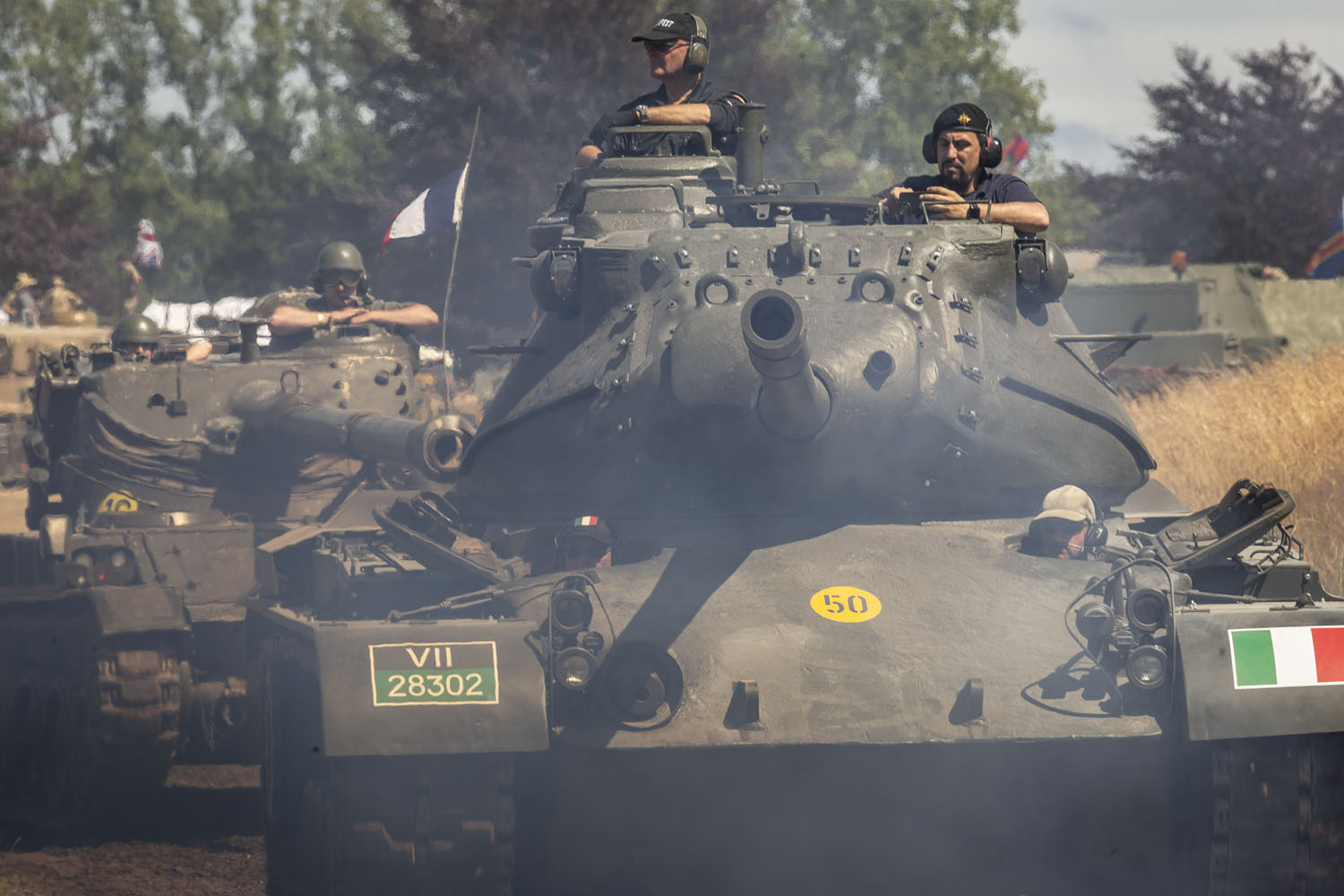 Tankfest 2025_1526 Front facing dark green tank with four crew visitble.