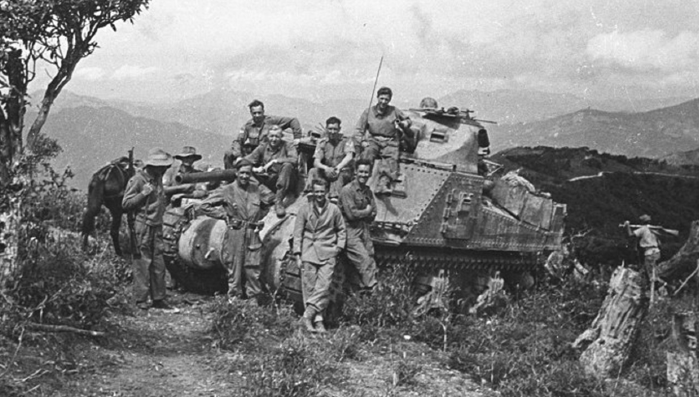 0016-GW - M3 Medium Lee with 3rd Carabiniers, Kennedy Peak Black and white photograph showing a group of tankies posing on an M3 Lee tank in Burma during the Second World War.
