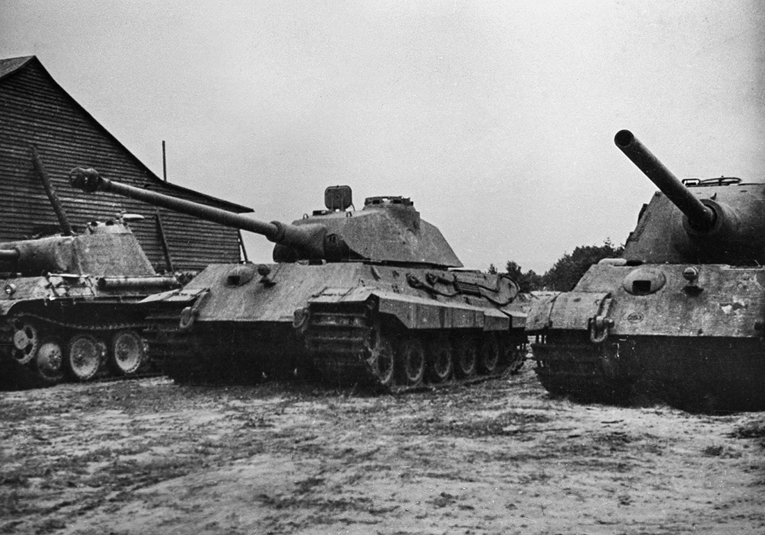 2907-D3-EDIT Black and white photograph of three tanks.